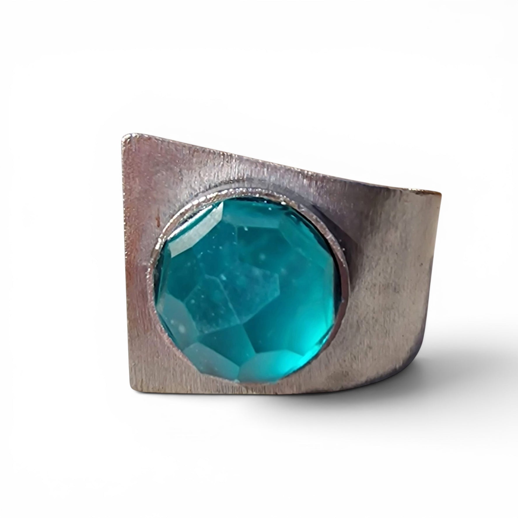 Selce Murano glass cuff bracelet — faceted teal glass set in hand-forged wrought iron, front view