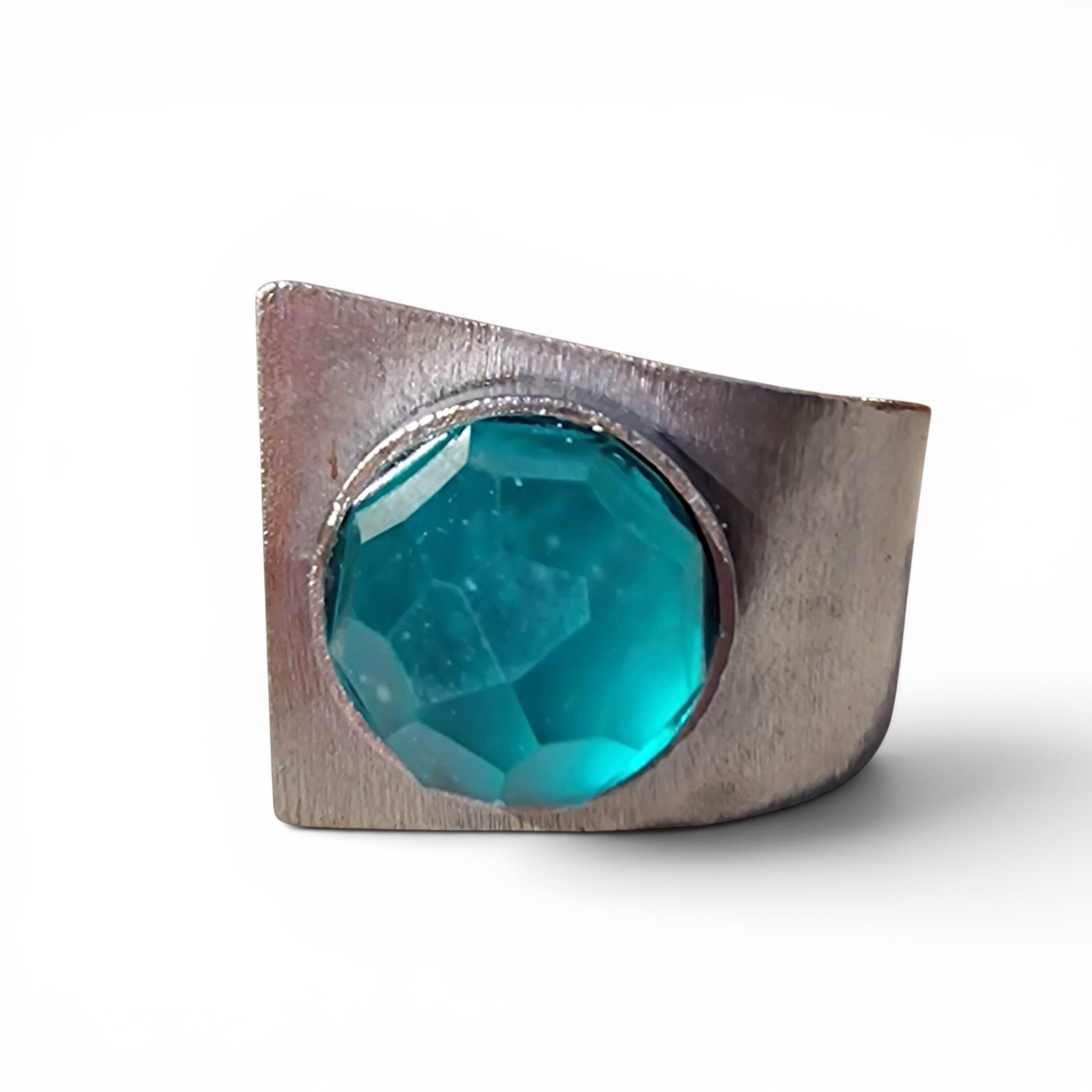 Selce Murano glass cuff bracelet — faceted teal glass set in hand-forged wrought iron, front view